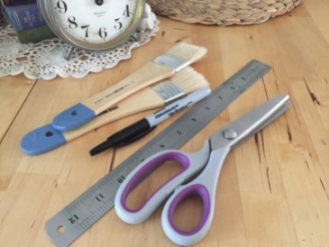 Paintbrushes, ruler, pen, pinking shears